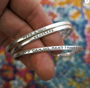 Five "Strong Fleming Woman" Cuffs